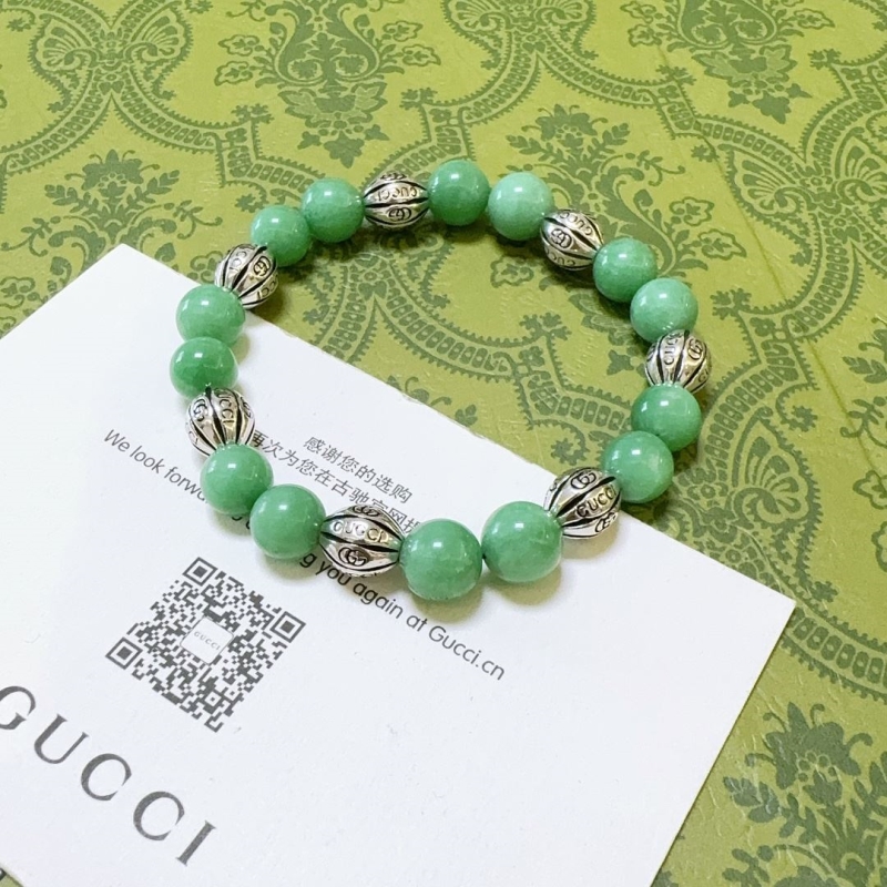 G*u*i bracelets